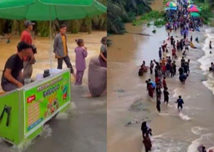 Sebuah video yang merekam ramainya warga menikmati luapan air banjir seolah menjadi tempat wisata dadakan viral di media sosial. (Istimewa)