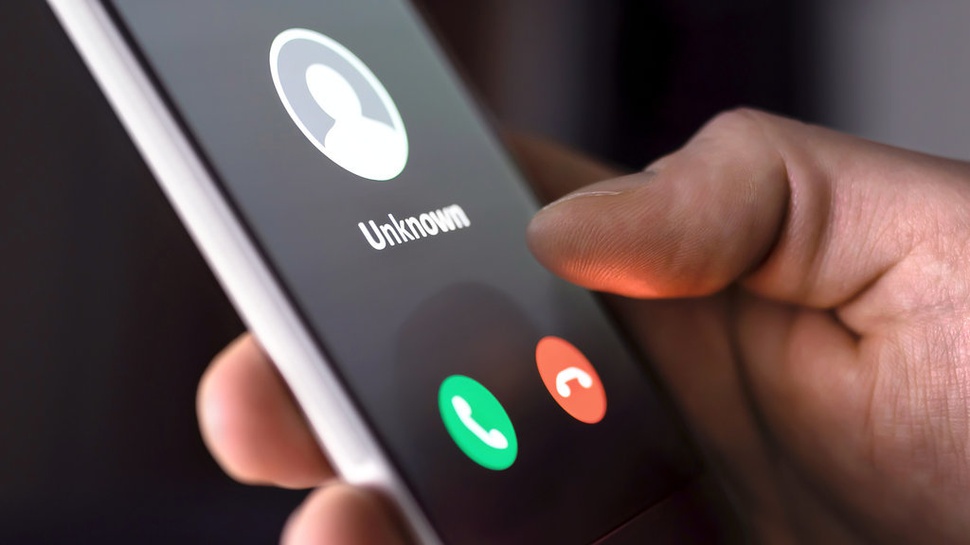 Ilustrasi telepon masuk dari nomor yang tidak dikenal. FOTO/iStockphoto