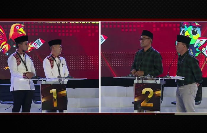 Pasangan Mathur-Jayus saat  Tampil di Debat Publik Pertama Cabup Dan Cawabup Bangkalan Tahun 2024. (Tangkapan Layar Youtube JTV)