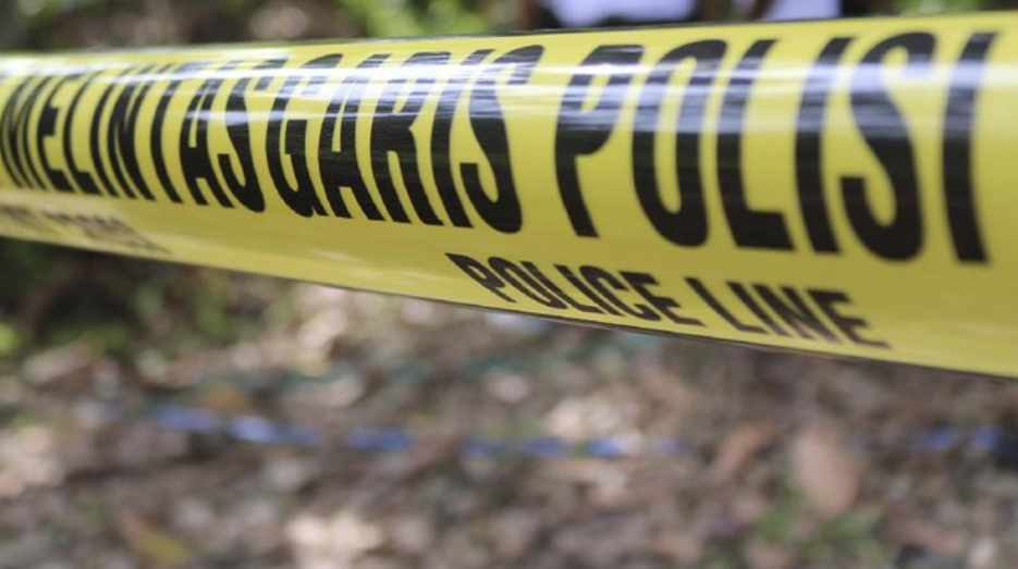 Ilustasi garis polisi yang menjaga tempat kejadian perkara. (iStockphoto/Herwin Bahar)