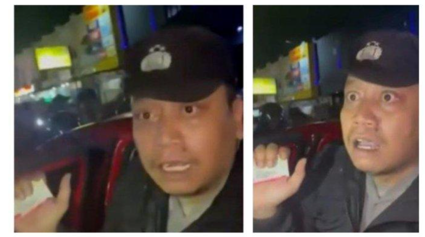 Oknum polisi menunjukkan KTA saat digerebek warga di Telaga Mas Semarang, Jumat (31/1/2025) malam. Dua polisi diduga memeras pasangan kekasih dalam mobil dan kini ditahan.