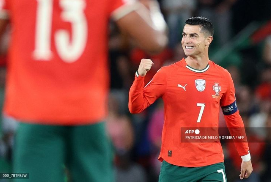 Cristiano Ronaldo merayakan gol dalam pertandingan sepak bola grup F zona Eropa Kualifikasi Piala Dunia 2026.  (Foto oleh PATRICIA DE MELO MOREIRA / AFP)(AFP/PATRICIA DE MELO MOREIRA)