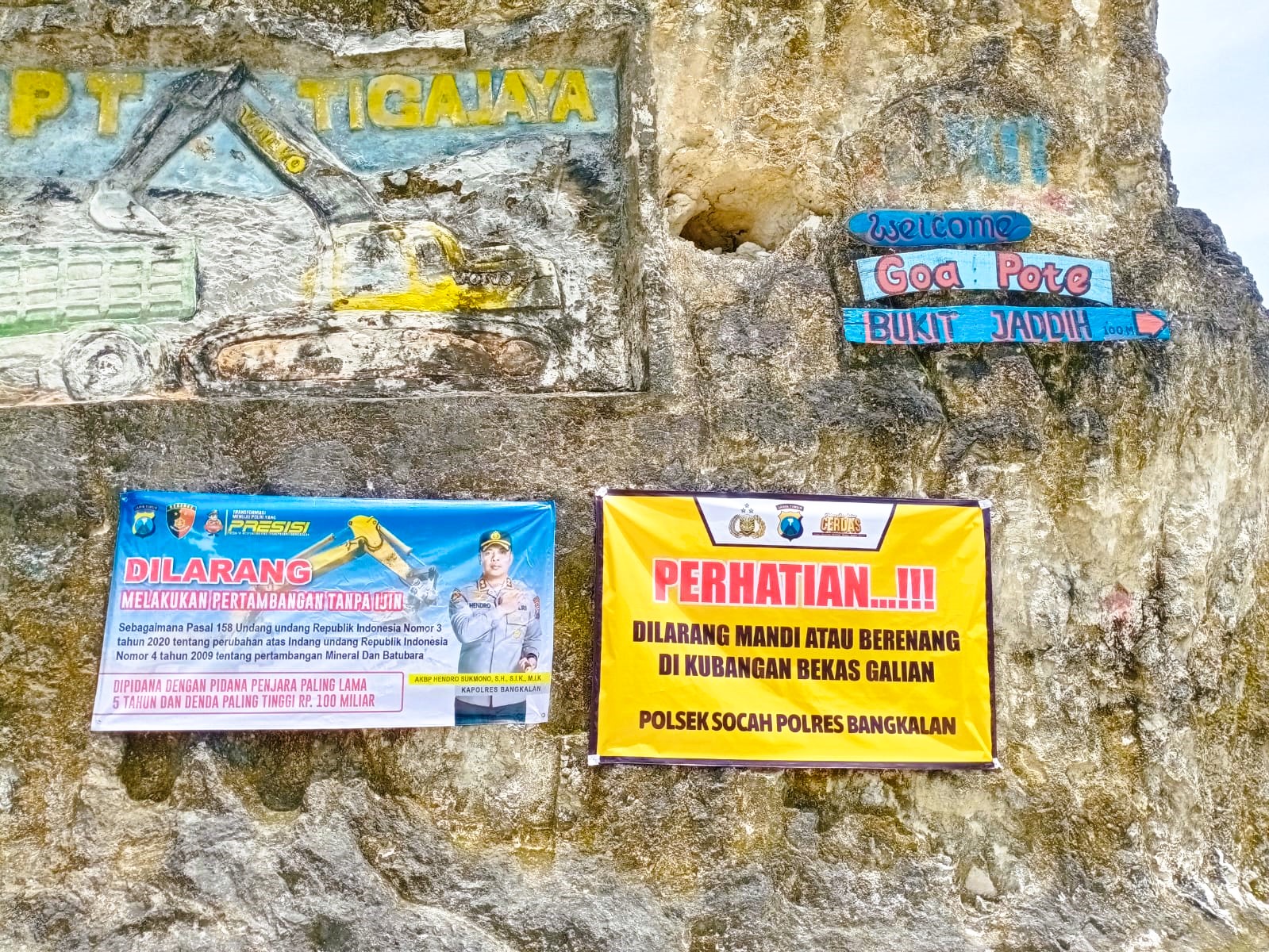 BERMASALAH: Lahan eks galian C di Desa Parseh, Kecamatan Socah Bangkalan dipasangi banner, Rabu (26/11).