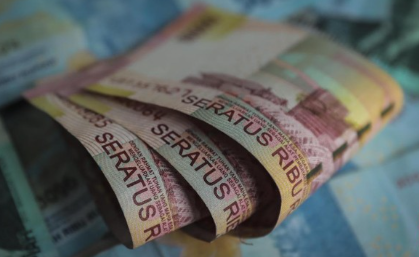 Setiap pihak yang menolak pembayaran rupiah dalam bentuk tunai di Indonesia bisa dikenakan sanksi pidana paling lama satu tahun dan denda maksimal Rp200 juta. Ilustrasi. (CNN Indonesia/Hesti Rika).