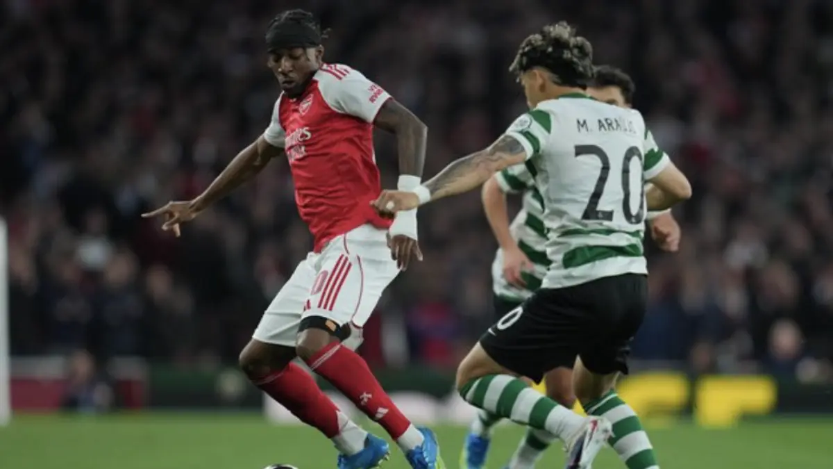 Aksi Noni Madueke dalam laga Arsenal vs Sporting CP di leg kedua perempat final Liga Champions 2025/2026, Kamis
(16/4/2026). (c) AP Photo/Kin Cheung