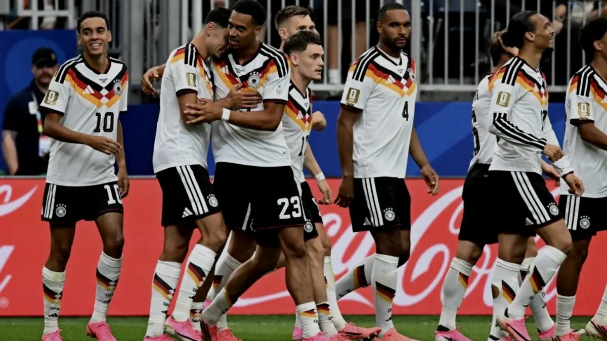 Jamal Musiala merayakan gol dengan rekan satu tim dalam pertandingan sepak bola Grup E Piala Dunia 2026 antara Jerman vs Curacao di
Stadion Houston di Houston pada 14 Juni 2026. (Foto oleh Paul ELLIS / AFP) (AFP/PAUL ELLIS)