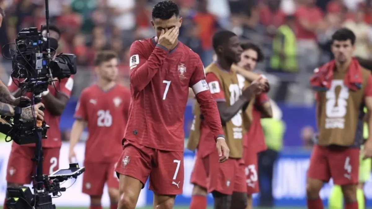 Reaksi kapten timnas Portugal, Cristiano Ronaldo, setelah kalah dalam laga babak 16 besar Piala Dunia 2026 antara Portugal dan Spanyol di Stadion Dallas di Arlington pada 6 Juli 2026.(AFP/THOMAS COEX)