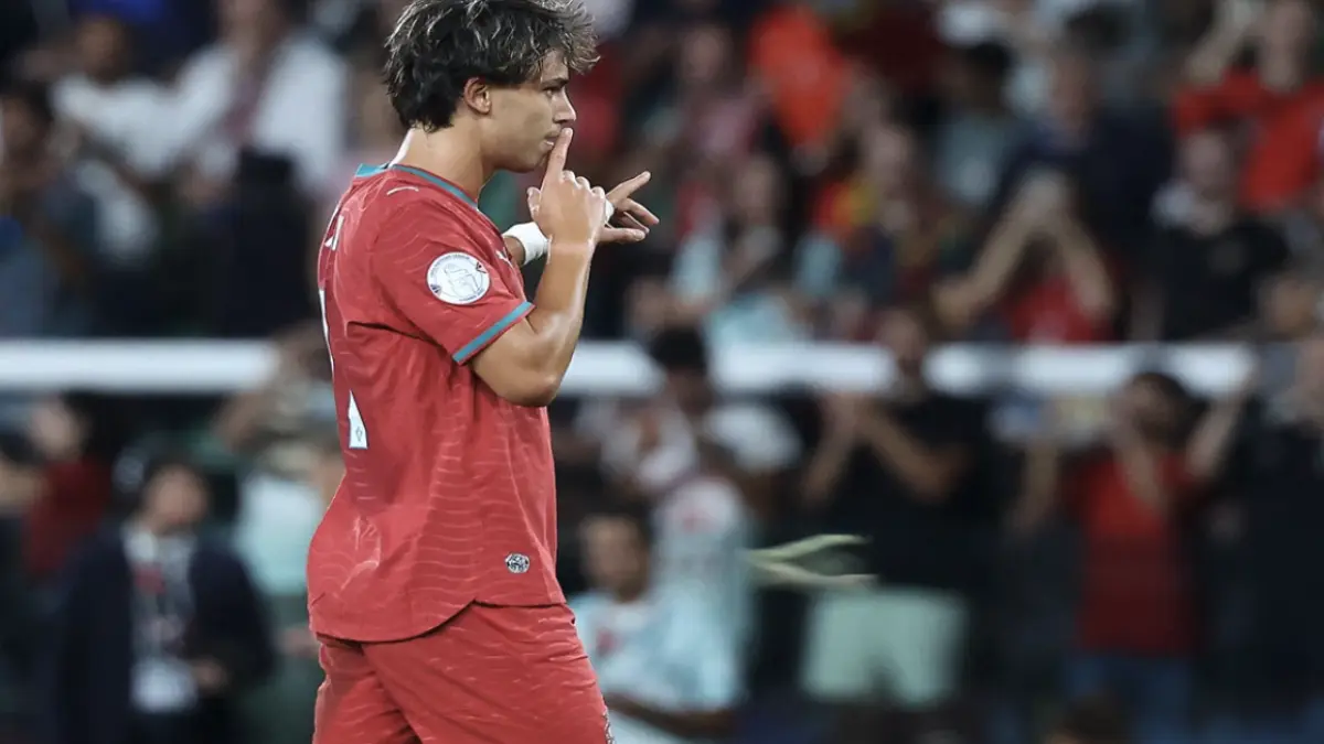 Penyerang timnas Portugal Joao Felix melakukan selebrasi usai mencetak gol ke gawang timnas Wales di laga UEFA
Nations League.(AFP/PATRICIA DE MELO MOREIRA)