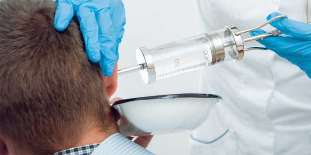 Ilustrasi irigasi telinga