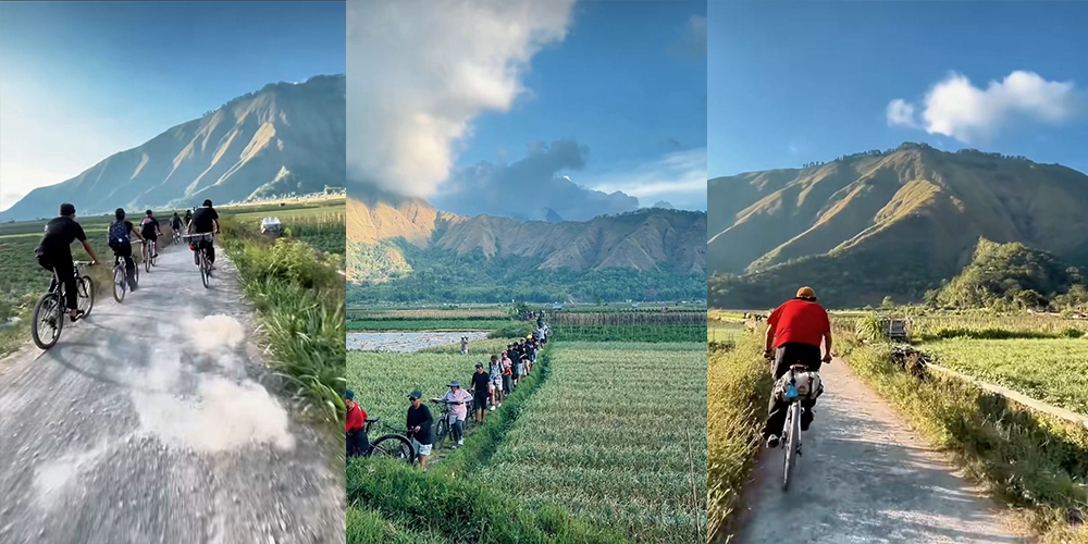 Pesepeda melintasi jalur hijau Sembalun, Lombok Timur, dengan latar megah Gunung Rinjani. Rute ini menyajikan panorama pegunungan yang memanjakan mata
