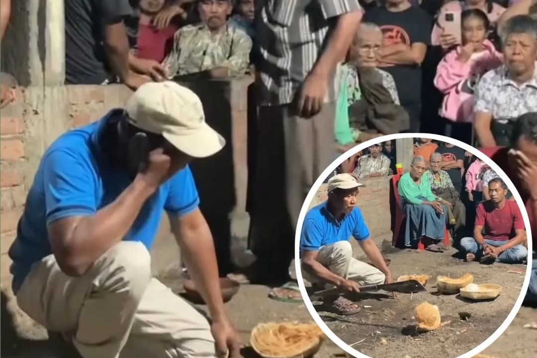 Molan, atau dukun tradisional ketika melakukan prosesi membelah kelapa. Dalam hal ini, molan akan memilih sebuah kelapa khusus dari yang tumbuh di tanah adat atau milik keluarga yang bersangkutan