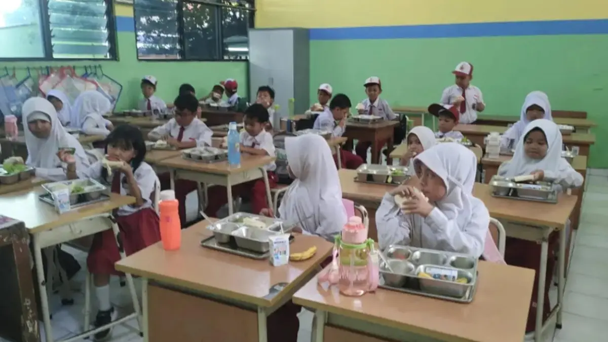 Pelaksanaan Program Makan Bergizi Gratis (MBG) Sumber foto : (Dok. Jawapos).