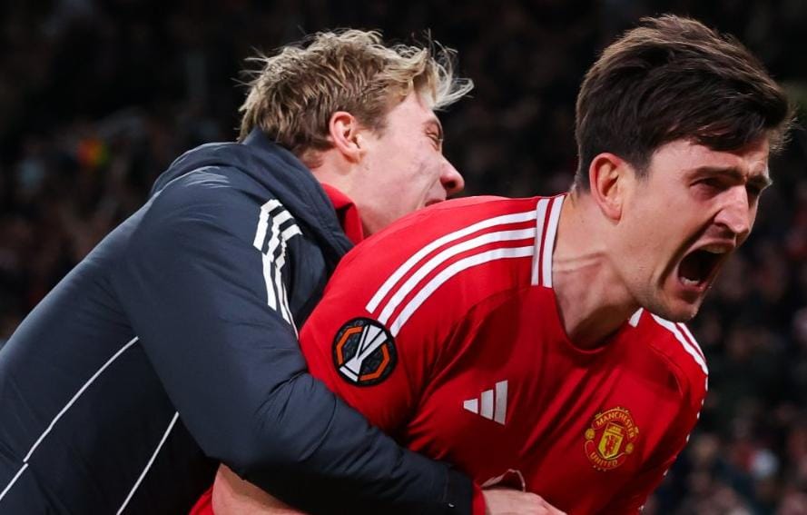 Selebrasi Harry Maguire setelah membawa Manchester United menang atas Lyon di Europa League.