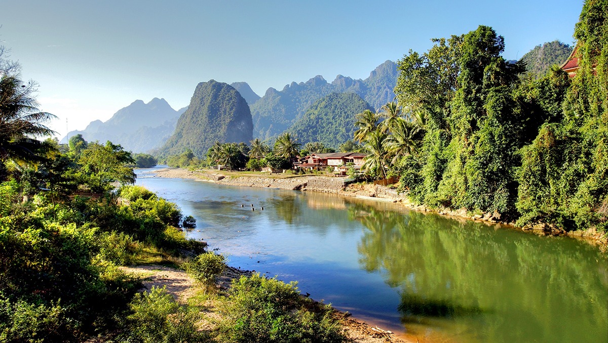 Surreal landscape by the Song river at Vang Vieng, Laos