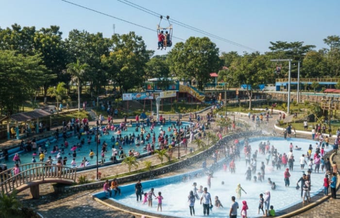 Prompt:  Foto realistik suasana Wisata Magetan Park di siang hari, taman rekreasi keluarga dengan kolam renang ramai pengunjung, area mandi salju dengan butiran salju buatan beterbangan, serta wahana