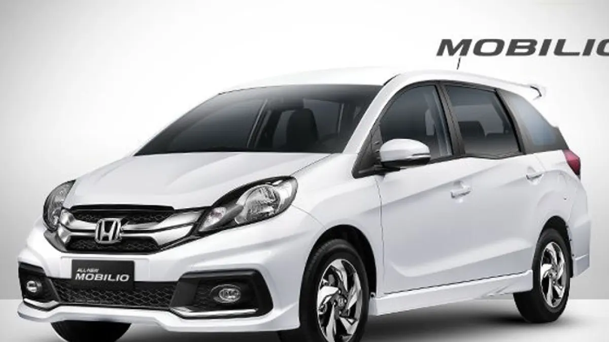 Mobil 7 penumpang murah di bawah Rp50 juta ini punya kabin lega, irit BBM, perawatan mudah, cocok buat keluarga.(Gemini AI)