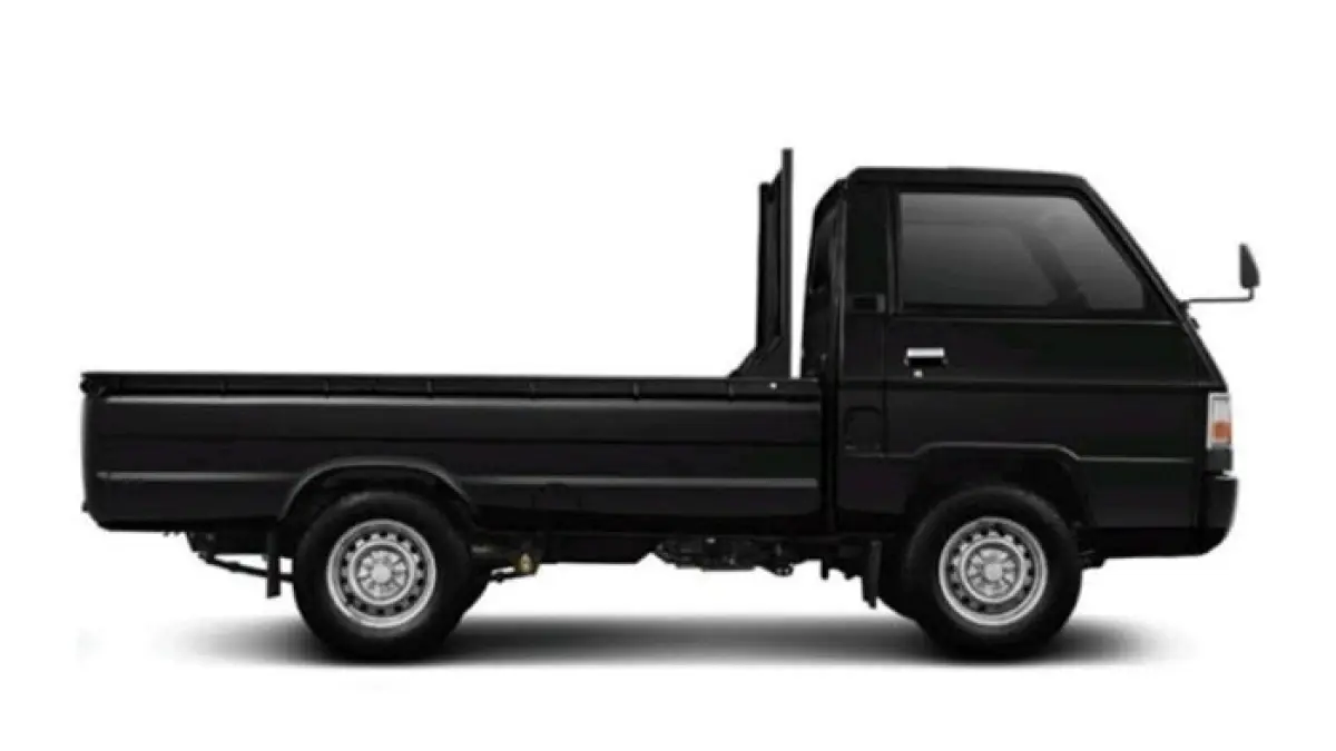 Harga Mitsubishi L300 bekas 2026 menarik perhatian. Unit tahun 2022 ditawarkan sekitar Rp170 juta dengan pajak dan KIR aktif, cocok untuk usaha.(Gemini AI)