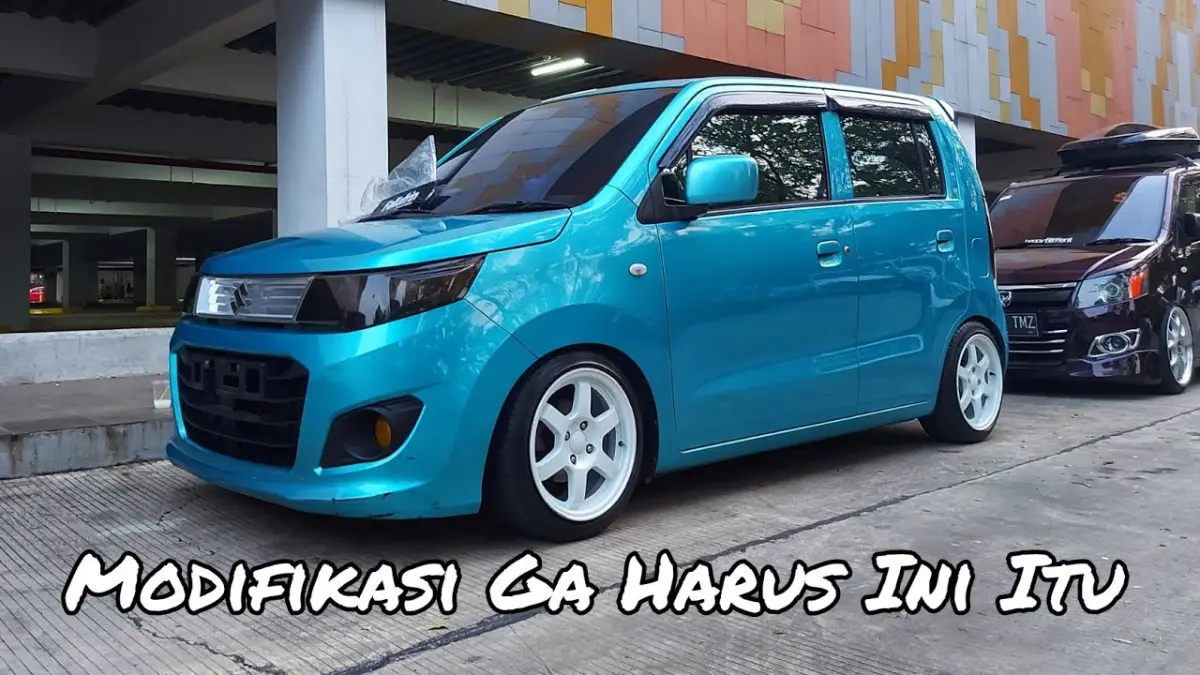 Modifikasi Suzuki Karimun Wagon R 2014 tampil sporty dengan velg ring 15, per pendek, dan knalpot simpel. Cocok jadi inspirasi modifikasi harian. (Youtube. com)