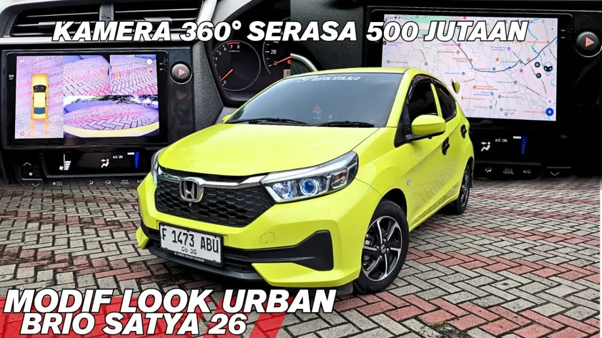 Modifikasi Honda Brio Electric Lime tampil makin sporty dengan body kit RS Urban, head unit canggih, fitur NFC, dan kamera 360 yang meningkatkan kenyamanan. (Youtube. com)