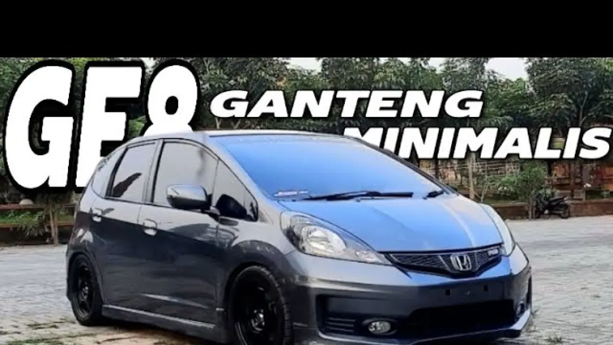 Modifikasi Honda Jazz GE8 bergaya simple racing look dengan velg Spoon, remap ECU, dan knalpot full system, tampil sporty tanpa biaya berlebihan. (Youtube. com)