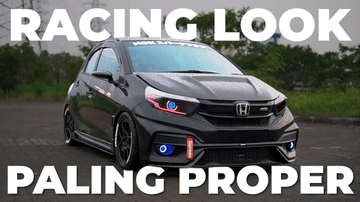 Inspirasi modifikasi Honda Brio 2015 bergaya street racing. Sukses swap engine pakai mesin Jazz GE8, rollbar 8 titik, dan full body kit serat karbon!