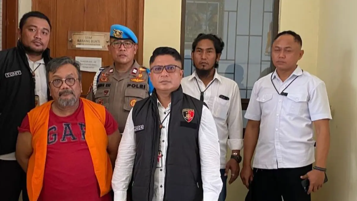 Togar Situmorang saat menjalani proses pelimpahan berkas perkara ke Kejaksaan Negeri Denpasar beberapa waktu lalu. (Istimewa) 