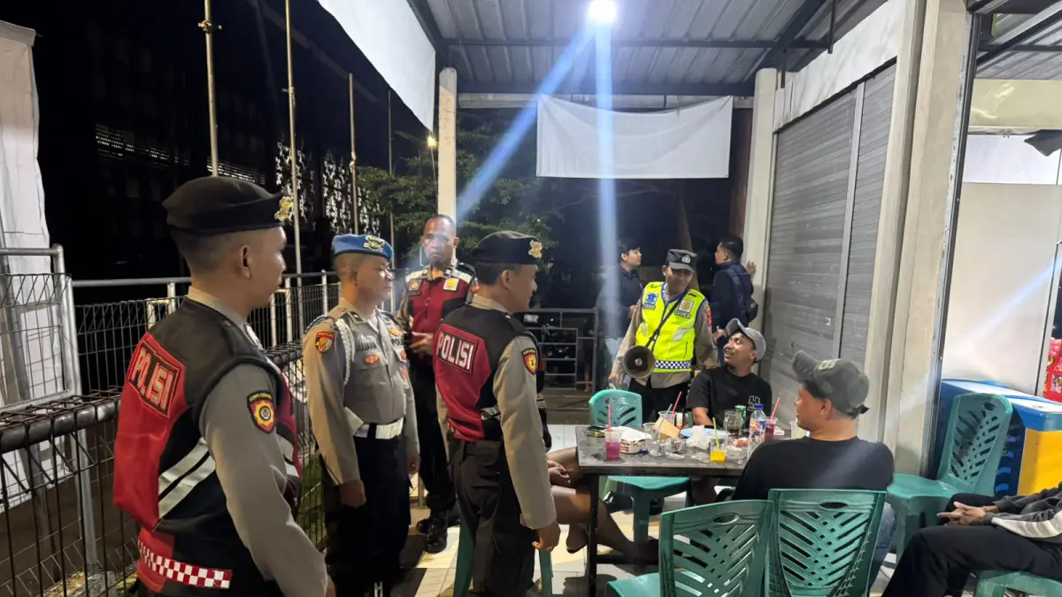 Personel kepolisian mendatangi lokasi keramaian guna mencegah gangguan keamanan.(Foto Polres Gianyar)