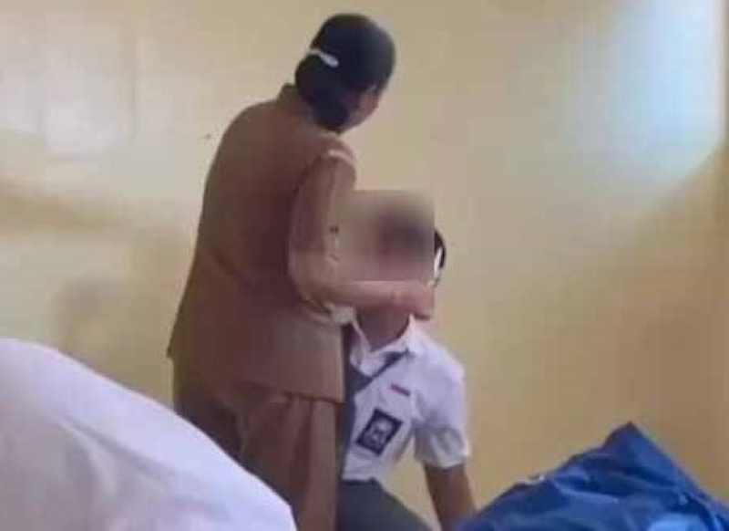 CUKUR RAMBUTNYA : Video pemotongan rambut siswa di SMKN 2 Singaraja ini sempat viral. (istimewa)