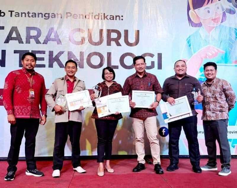 ADA MANTAN WARTAWAN RADAR BALI: Para guru duta SMA Negeri 2 Semarapura (Smadara) di jambore. Cahyanto Setyatmoko(kedua dari kiri) adalah mantan wartawan Radar Bali. (Foto: SMA Negeri 2 Semarapura)