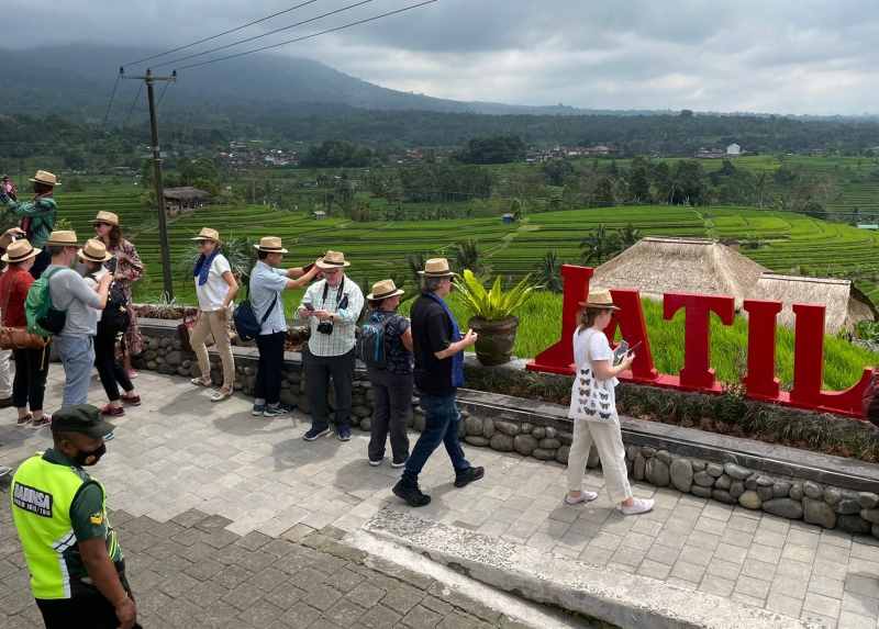 IKONIK: Suasana kawasan DTW Jatiluwih, Tabanan,  yang ditetapkan sebagai lahan sawah abadi dan masuk status warisan budaya dunia Unesco. (juliadi/radar bali)