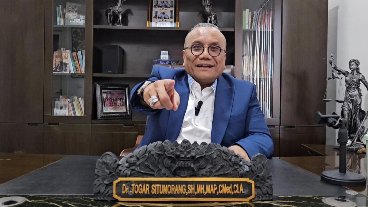 Dr. Togar Situmorang, S.H.
