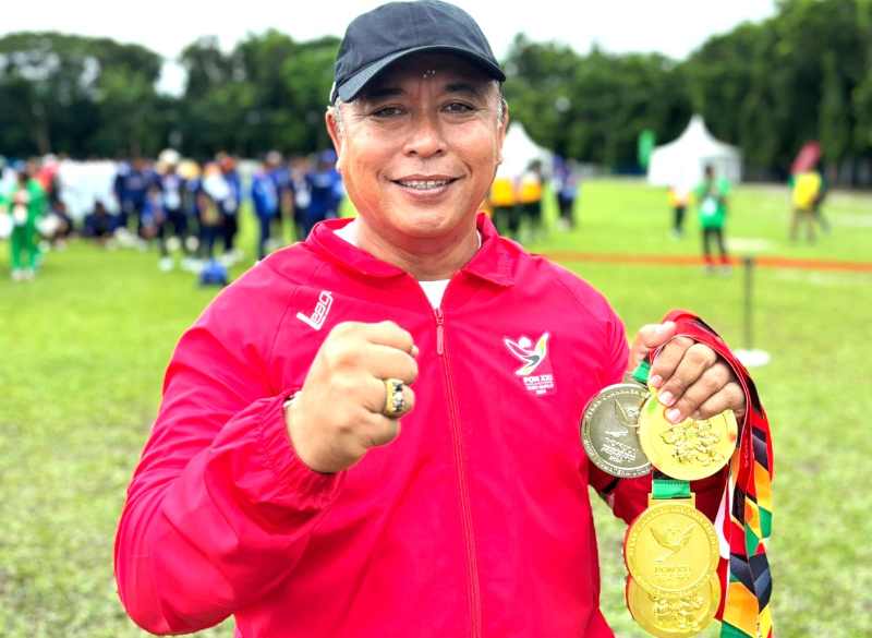 MEDALI UNTUK BALI : Gung Cok Arka, Manajer Tim Tarung Derajat Bali.( Foto IG PON Bela Diri Kudus)