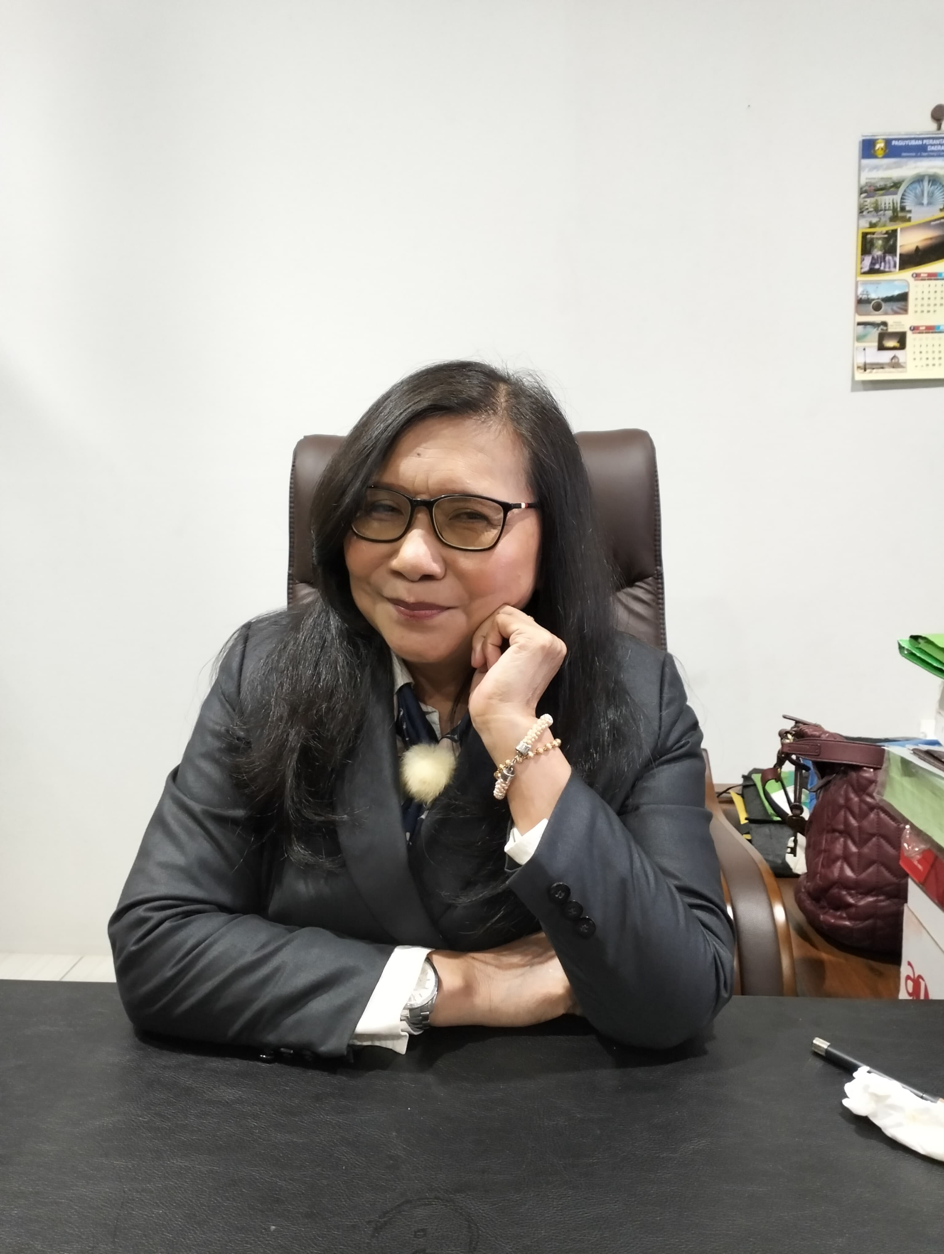 Siti Sapurah, SH. (Ipung).