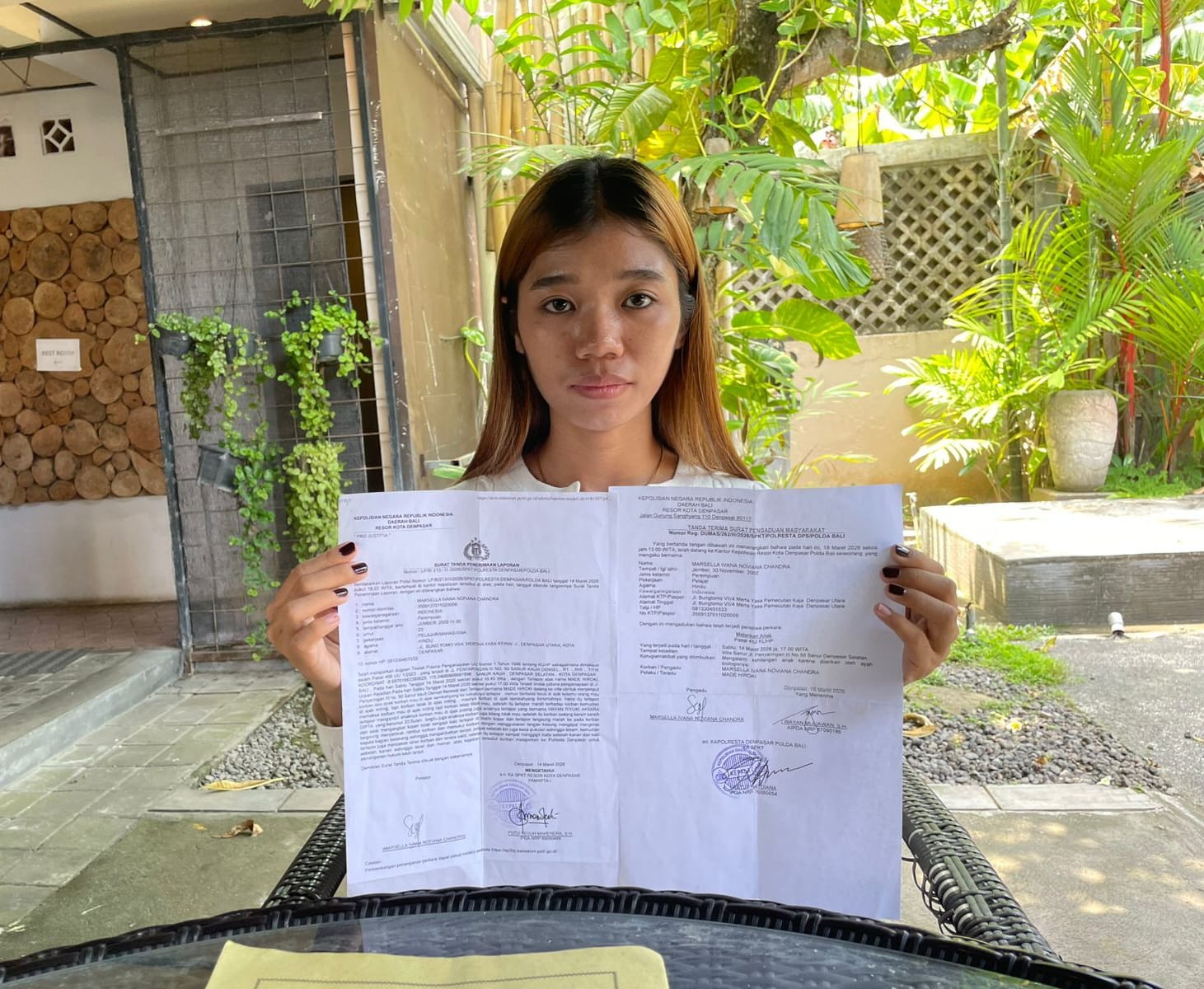 Marsella Ivana saat melapor di Polresta Denpasar.