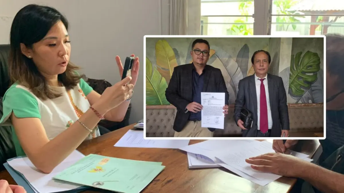 TEKEN AJB: Pelapor bersama suami sedang penandatangan AJB. Dua pengacara korban adakan Jumpa Pers di Denpasar, Selasa (19/5/2026). (IST/radarbali.id)
