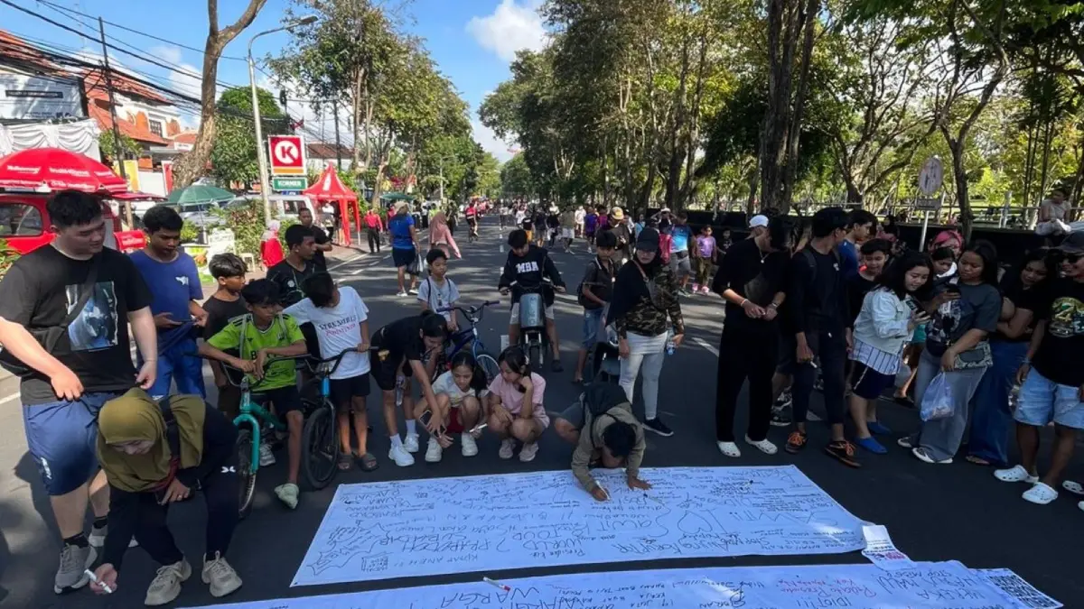 CARA LAIN: Aksi di Car Free Day (CFD) yang berlokasi di kawasan Lapangan Puputan Margarana Niti Mandala, Denpasar (14/6/2026). (ist/radarbali.id)
