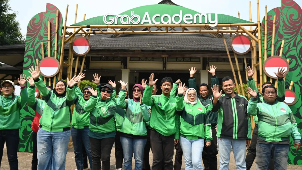 Antusiasme Mitra Pengemudi dalam menyambut peluncuran GrabAcademy: Peluang Tanpa Batas untuk Mitra Naik Kelas di Padepokan Pencak Silat TMII, Jakarta, Selasa (11/8).