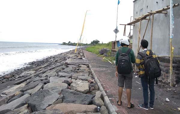 pantai-batu-tumpeng-destinasi-alternatif-berselancar-incaran-turis