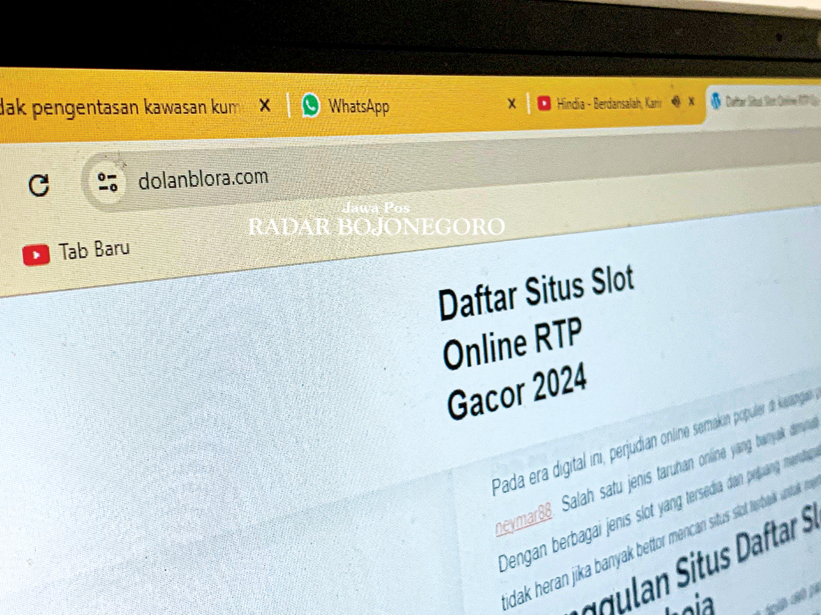DIRETAS: Tampilan website dolanblora.com berubah total akibat diretas. Semula berisi promosi pariwisata Blora, kini berubah menjadi promosi judi online. (RAHUL OSCARRA DUTA/RADAR BOJONEGORO)