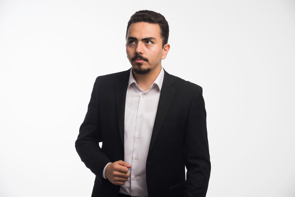 Ilustrasi pria berjas.