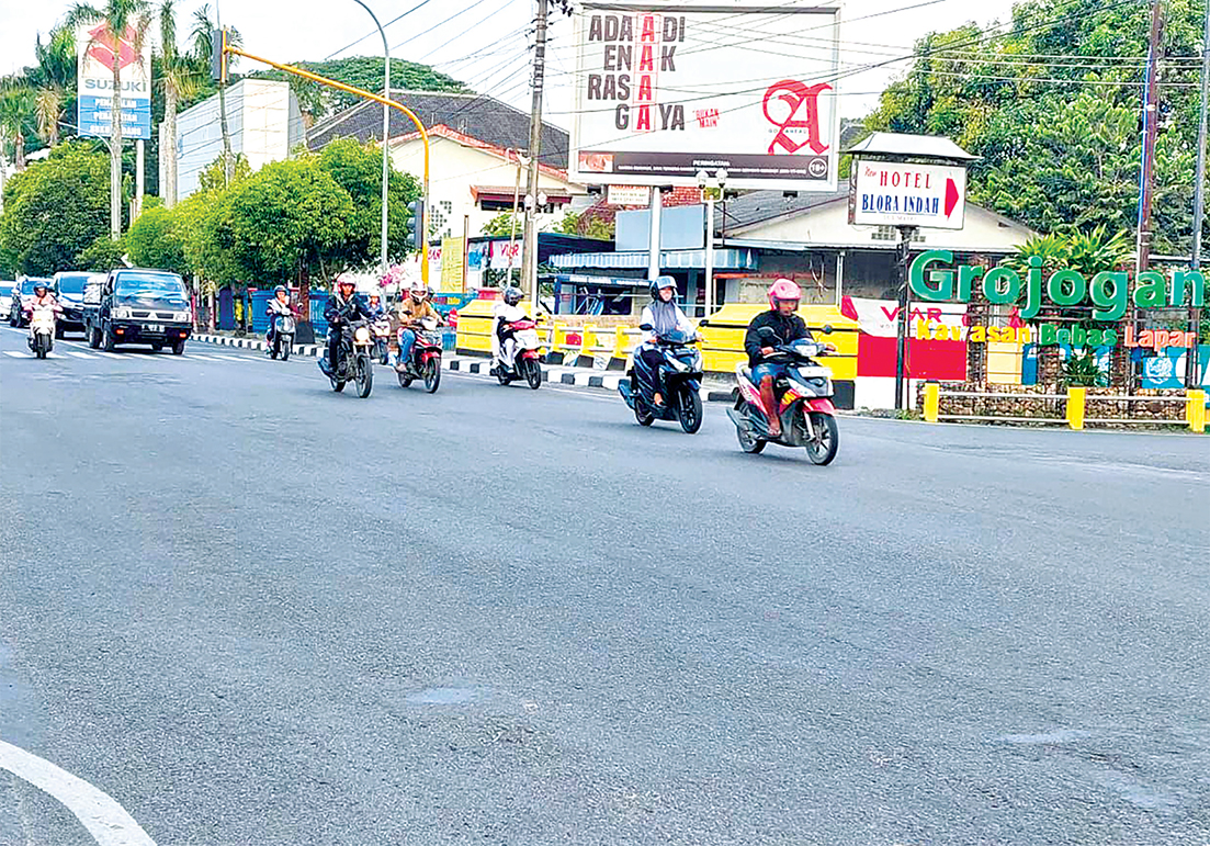 JADI SASARAN: Jalan Pemuda menjadi salah satu ruas yang rencana bakal dipasangi tapping box. (LUKMAN HAKIM/RADAR BOJONEGORO)
