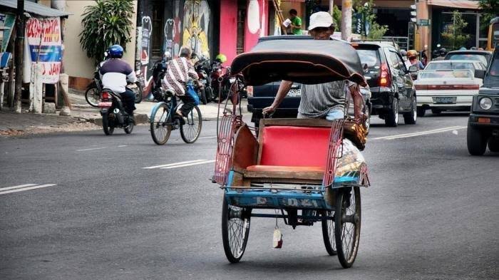 Pengayuh becak.