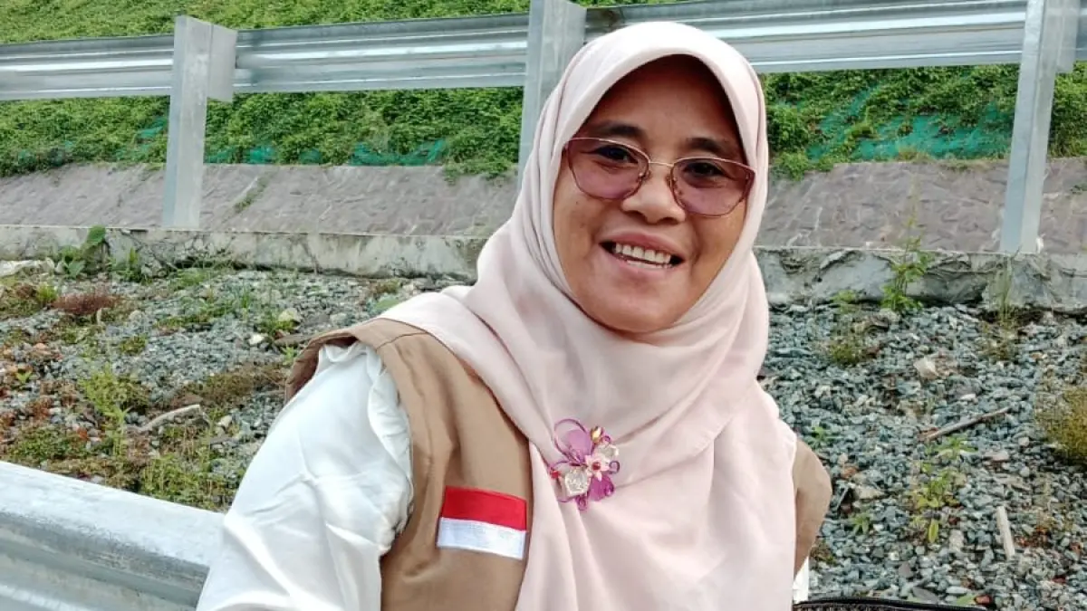 Dr. Sriatun, M.Pd