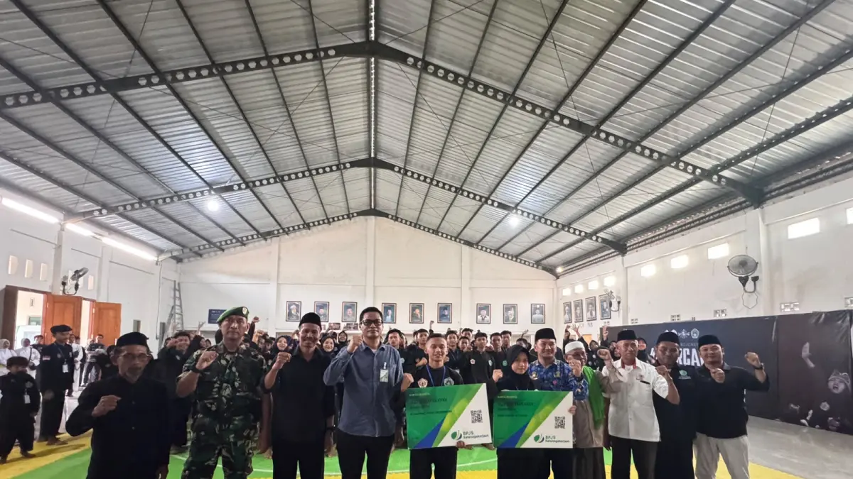 Penyerahan Simbolis Kepesertaan Peserta Kejurcab II Pagar Nusa di Bojonegoro. (ISTIMEWA/RADAR BOJONRGORO)