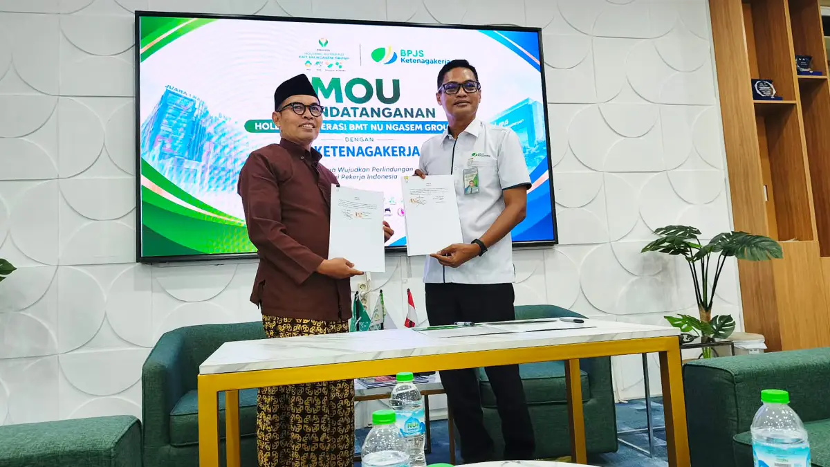 PERLUAS PERLINDUNGAN: BPJS Ketenagakerjaan Bojonegoro memperluas akses perlindungan tenaga kerja dengan menandatangani MoU kaegenan korporasi dengan BMT NU Ngasem, Rabu (23/9/2026).