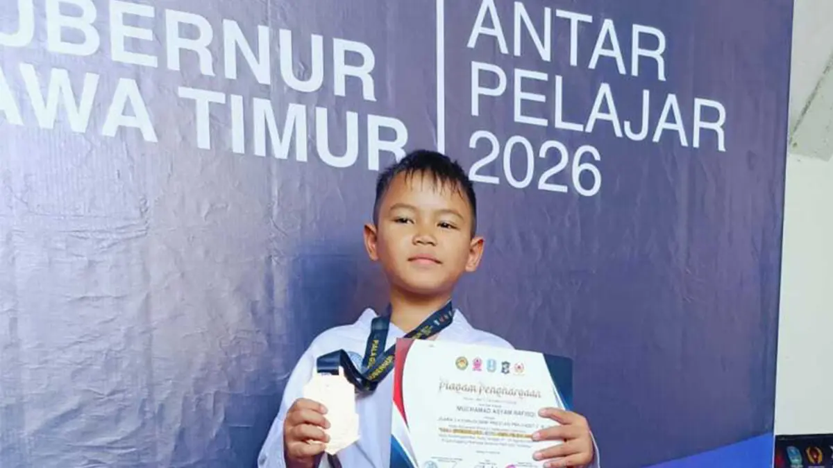 JUARA TIGA: Muchamad Asyam Rafisqi berhasil meraih juara tiga kyorugi tingkat provinsi