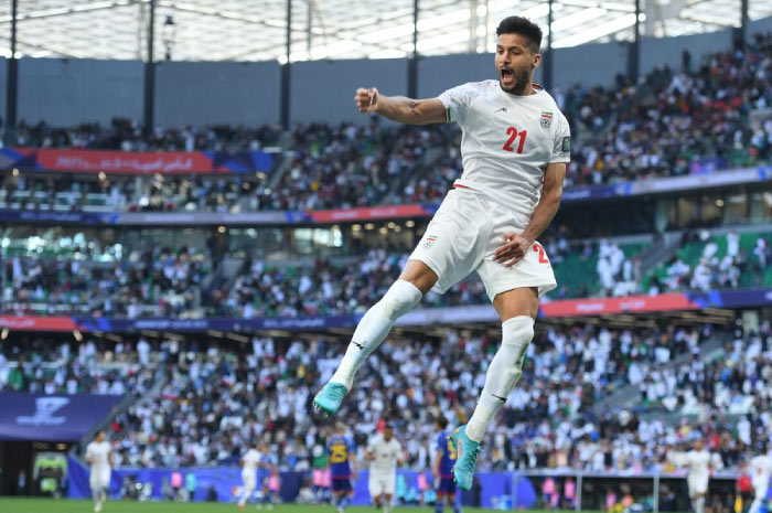 Selebrasi Mohammad Mohebi setelah mencetak gol ke gawang Jepang di perempat final Piala Asia 2023.