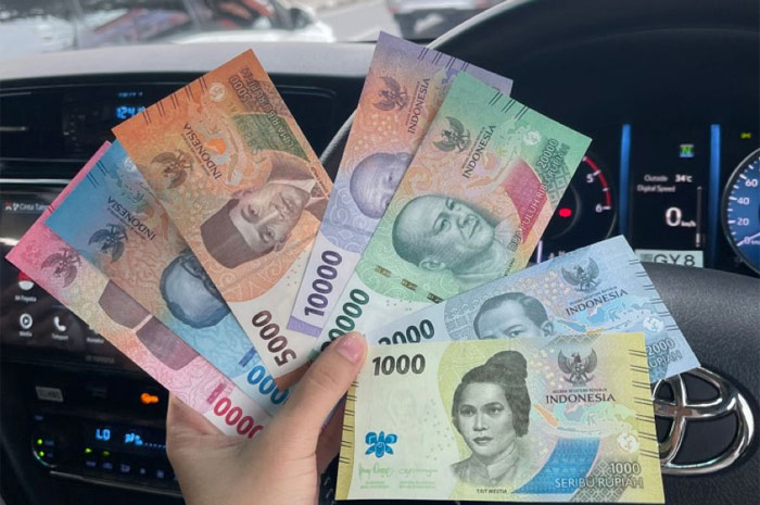 Ilustrasi cara tukar uang baru 2024 untuk lebaran.