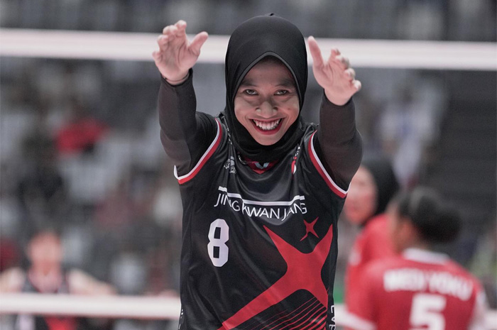 Ekpresi Megawati Hangestri Pertiwi saat bermain Fun Volleyball bersama Red Saprks di Jakarta.