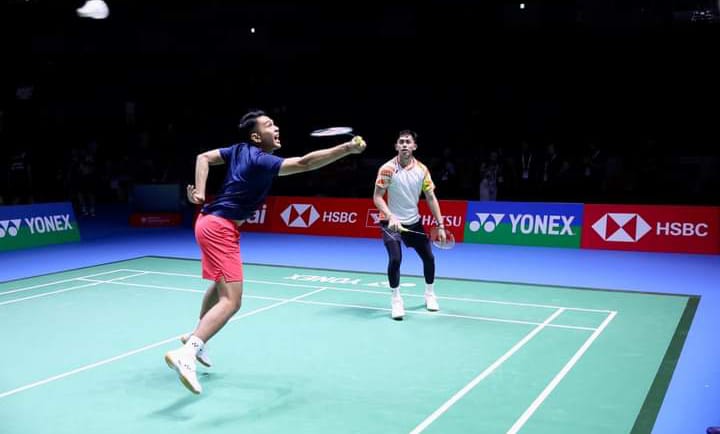 Fajar Alfian dan Muhammad Rian Ardianto saat mencoba lapangan di Yokohama Arena, Senin (19/8) sore.